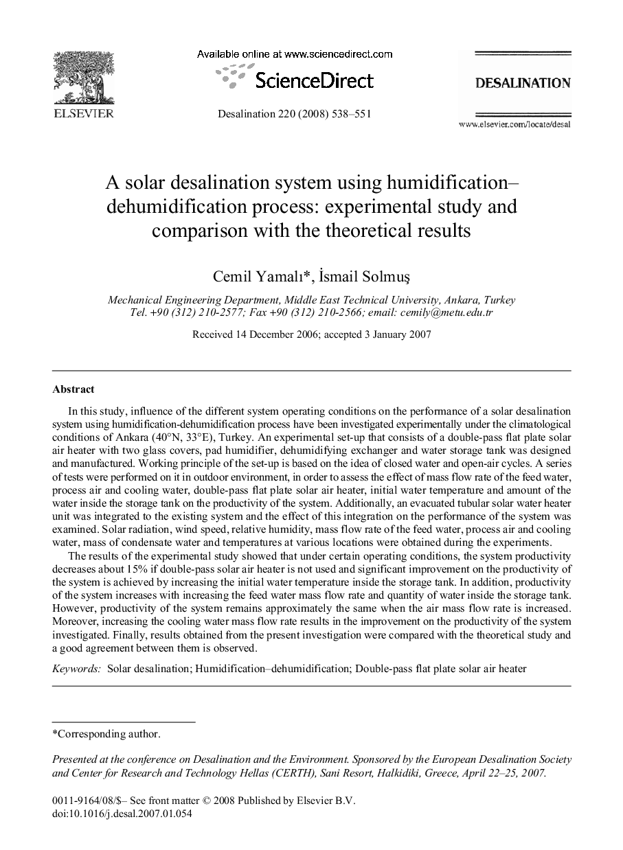 A solar desalination system using humidification-dehumidification process: experimental study and comparison with the theoretical results