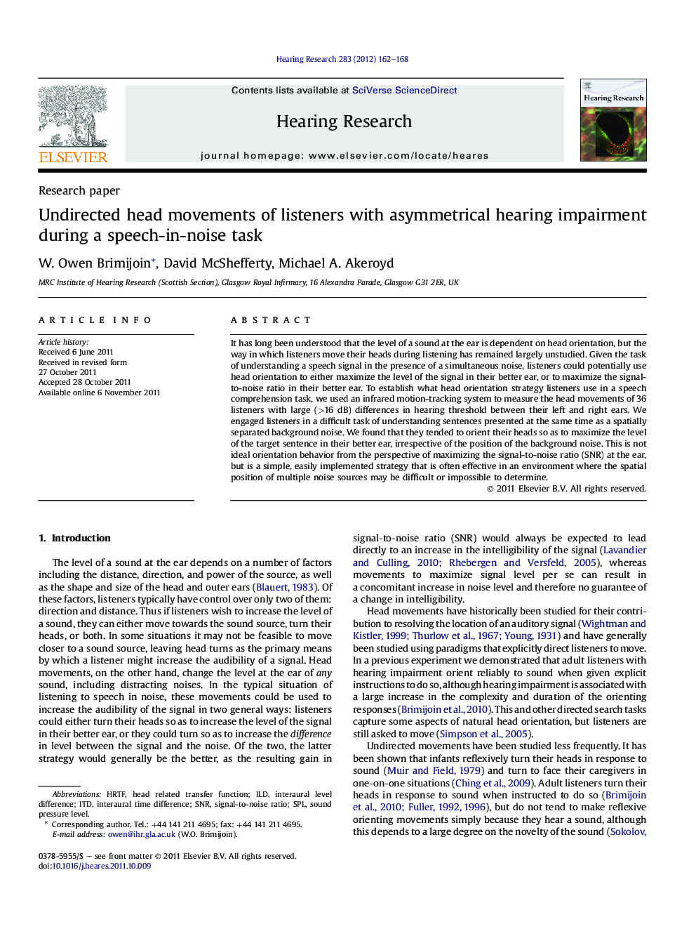 Undirected head movements of listeners with asymmetrical hearing impairment during a speech-in-noise task