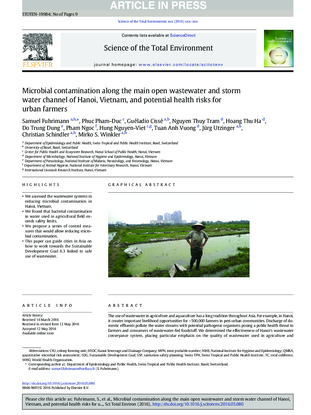 Microbial contamination along the main open wastewater and storm water channel of Hanoi, Vietnam, and potential health risks for urban farmers