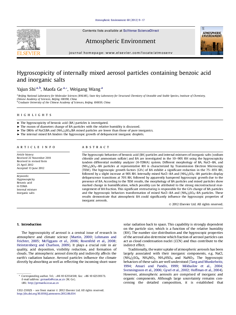 Hygroscopicity of internally mixed aerosol particles containing benzoic acid and inorganic salts