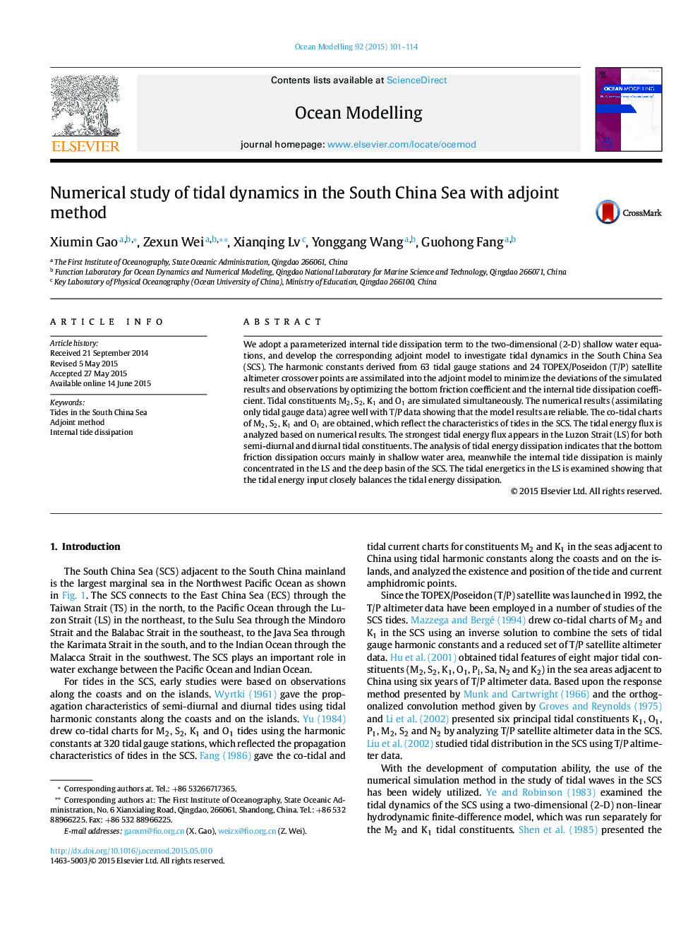 Numerical study of tidal dynamics in the South China Sea with adjoint method