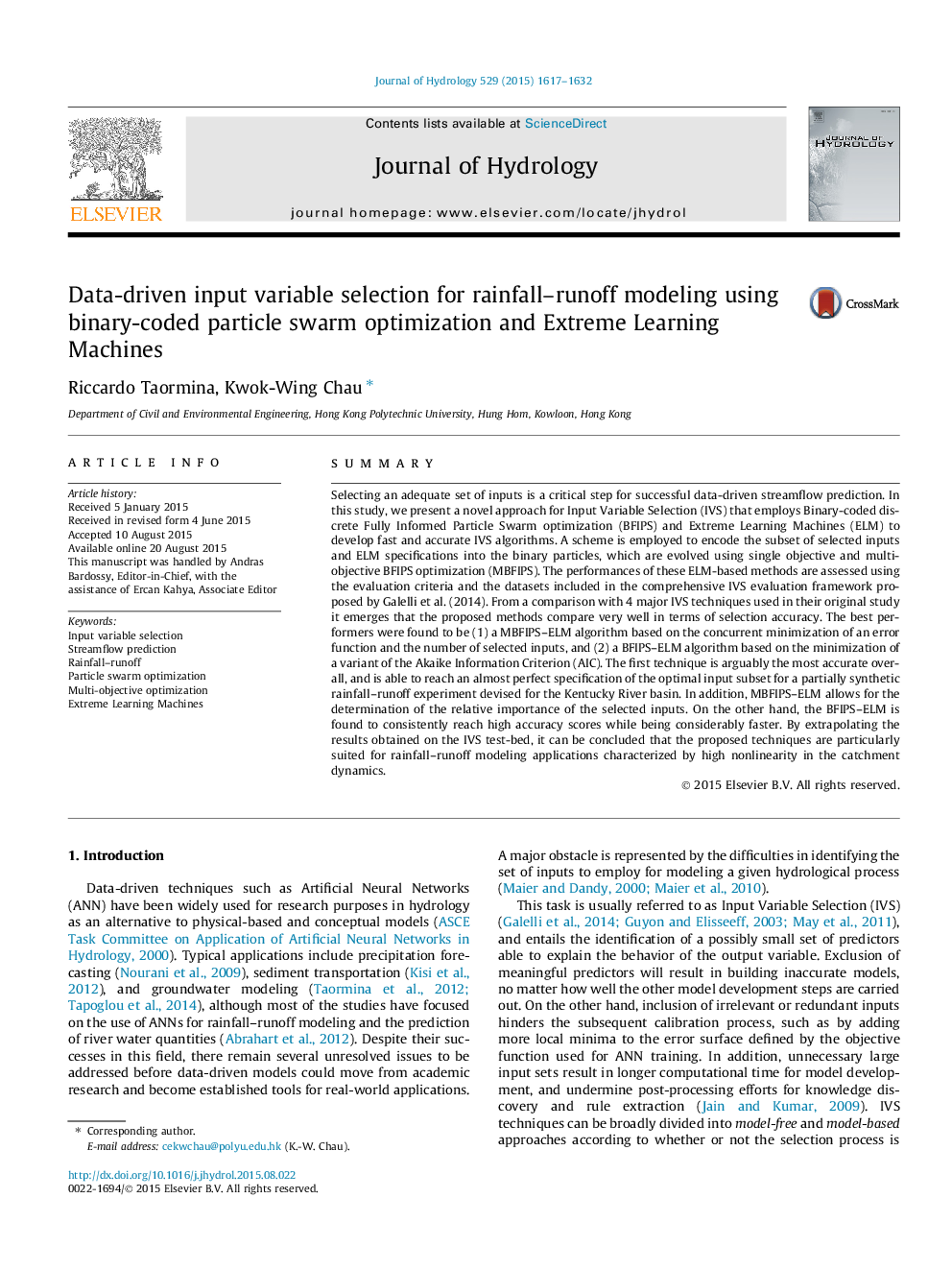 Data-driven input variable selection for rainfall-runoff modeling using binary-coded particle swarm optimization and Extreme Learning Machines