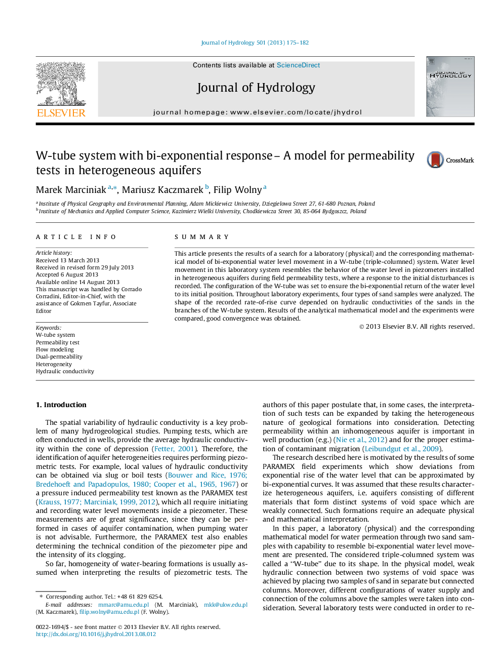 W-tube system with bi-exponential response - A model for permeability tests in heterogeneous aquifers