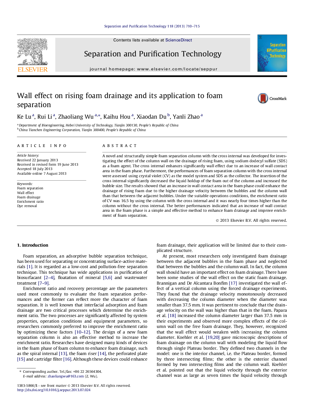 Wall effect on rising foam drainage and its application to foam separation