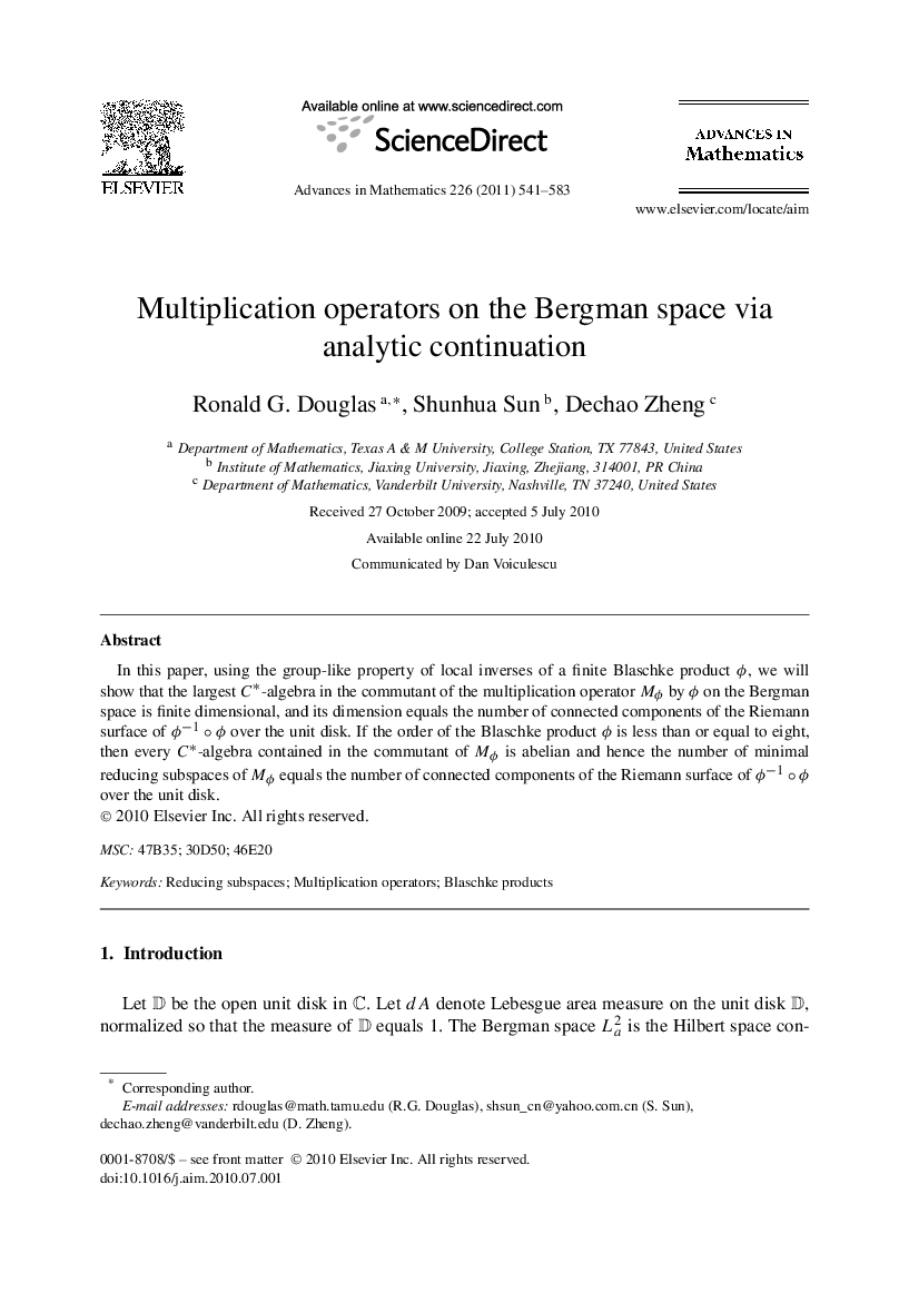 Multiplication operators on the Bergman space via analytic continuation