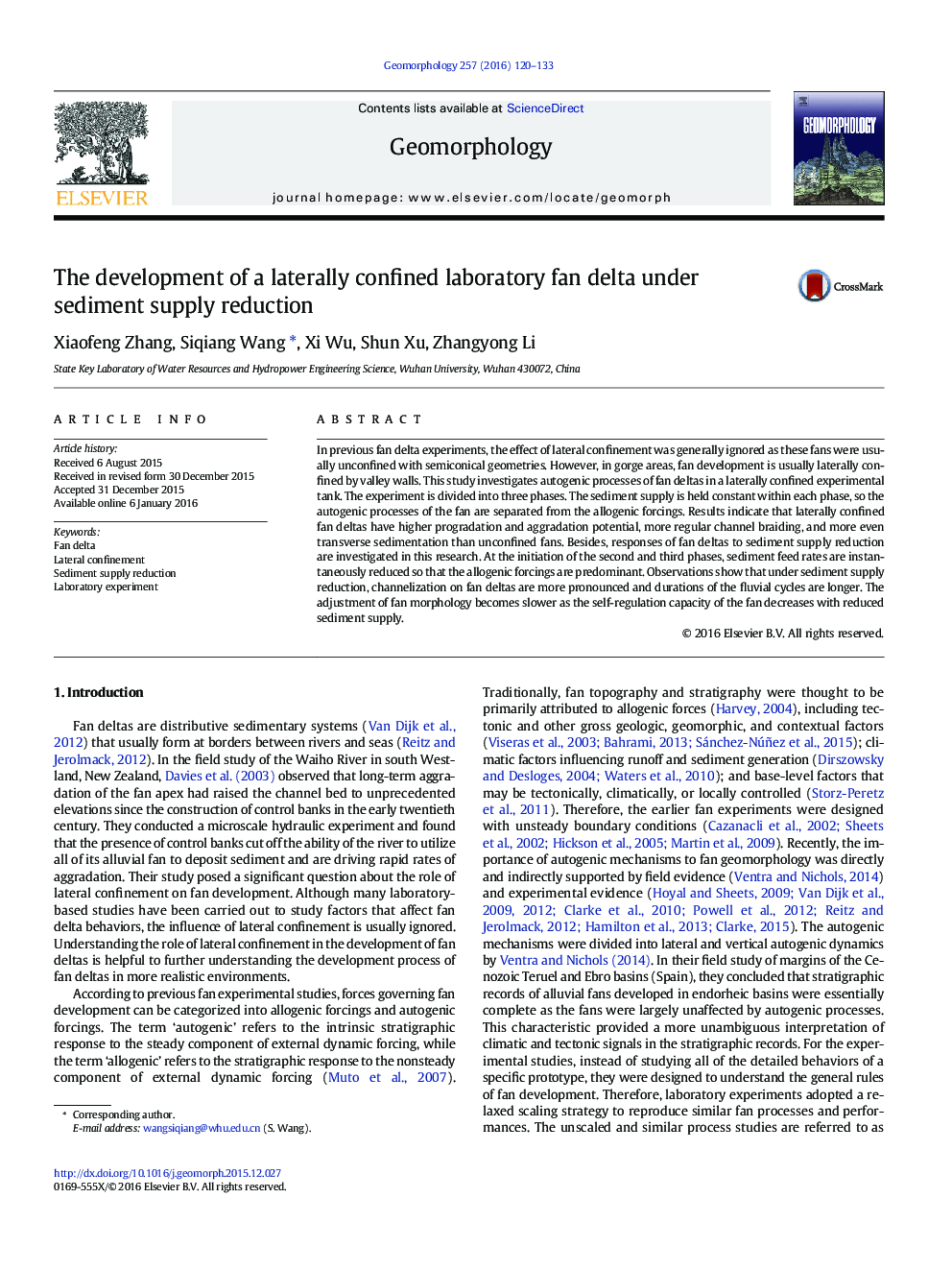 The development of a laterally confined laboratory fan delta under sediment supply reduction