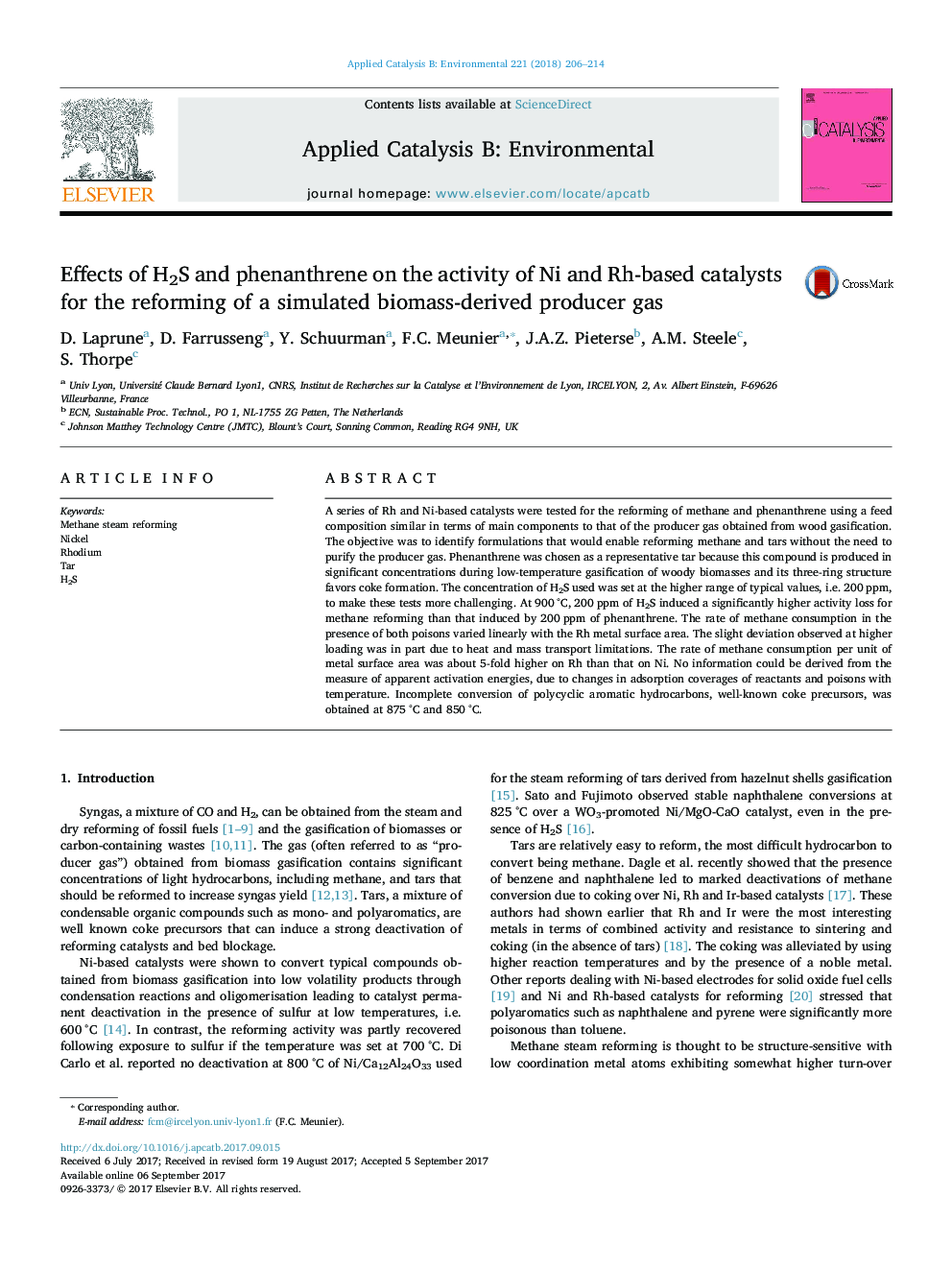 Effects of H2S and phenanthrene on the activity of Ni and Rh-based catalysts for the reforming of a simulated biomass-derived producer gas