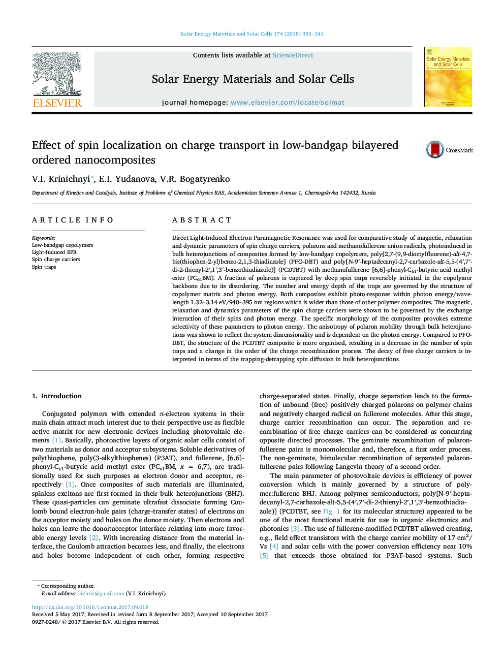 Effect of spin localization on charge transport in low-bandgap bilayered ordered nanocomposites