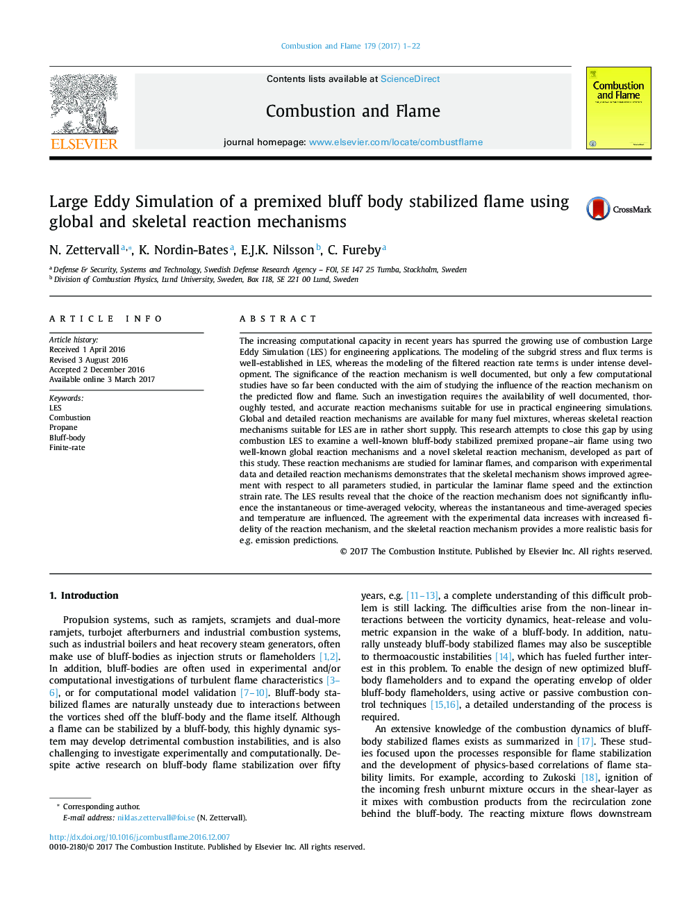 Large Eddy Simulation of a premixed bluff body stabilized flame using global and skeletal reaction mechanisms