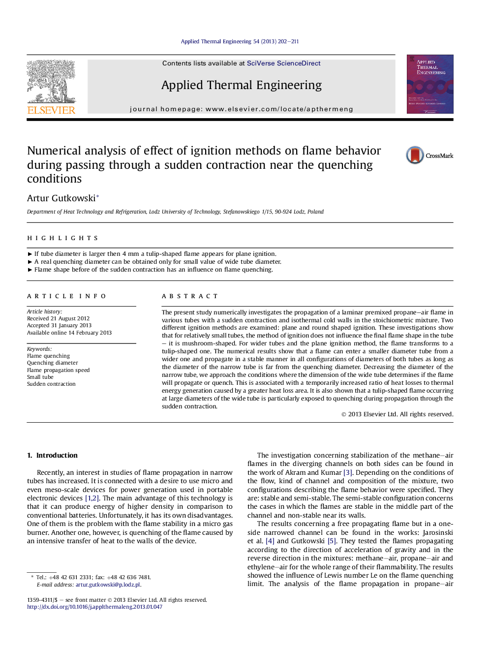 Numerical analysis of effect of ignition methods on flame behavior during passing through a sudden contraction near the quenching conditions