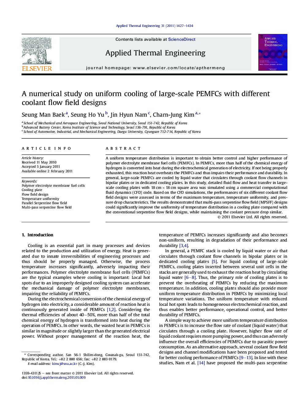 A numerical study on uniform cooling of large-scale PEMFCs with different coolant flow field designs