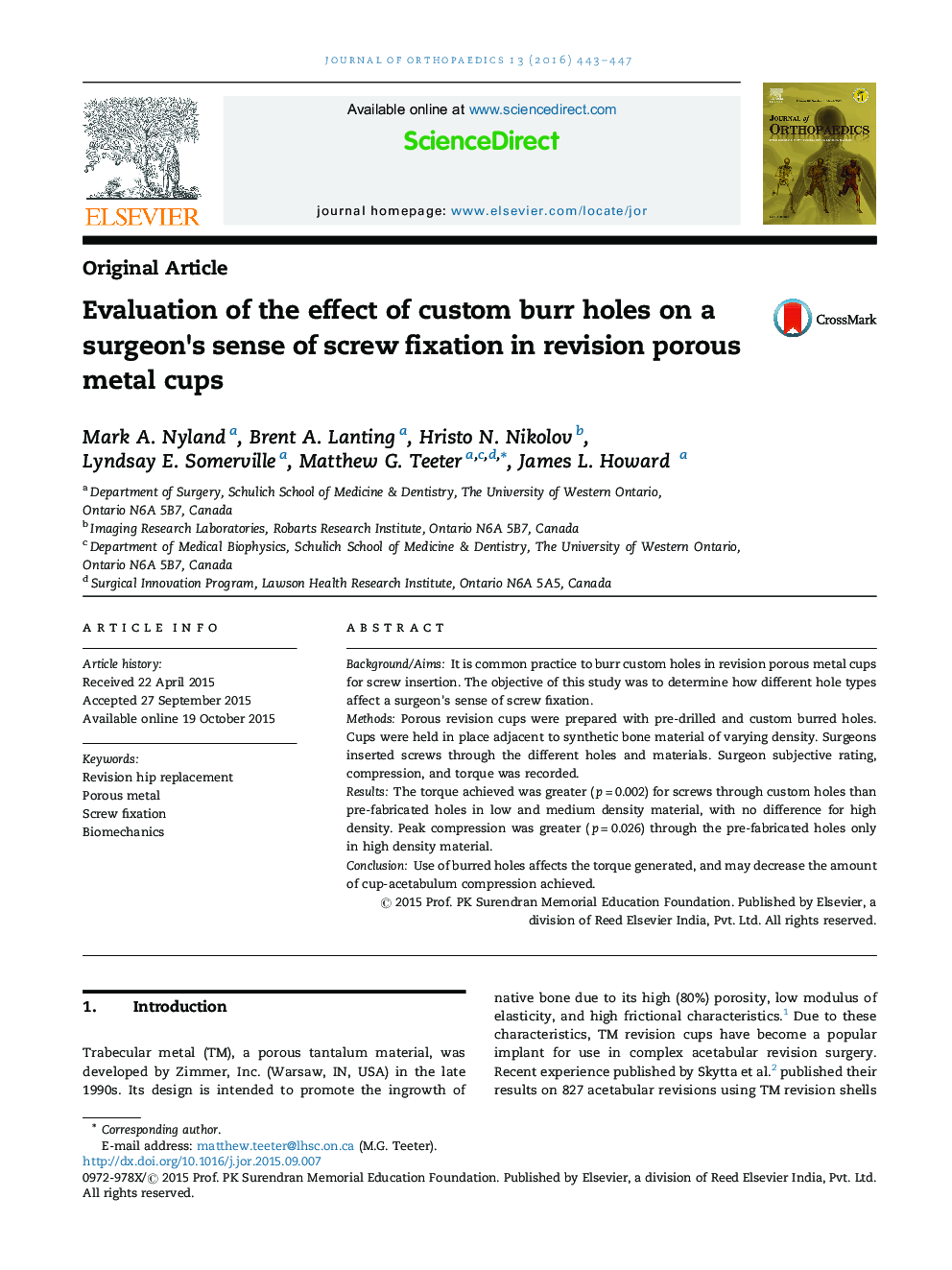 Evaluation of the effect of custom burr holes on a surgeon's sense of screw fixation in revision porous metal cups