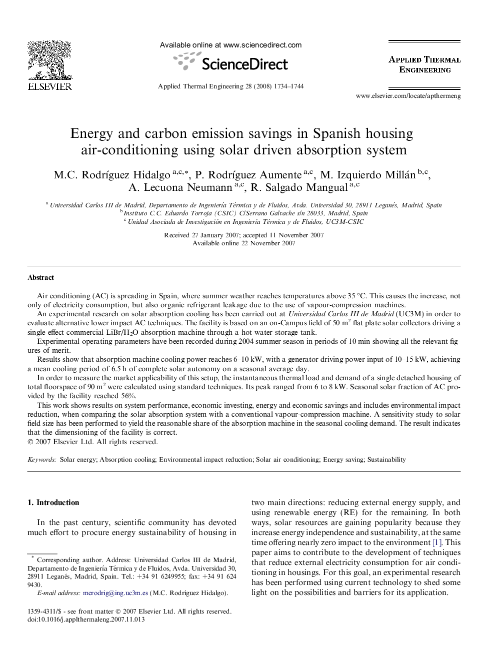 Energy and carbon emission savings in Spanish housing air-conditioning using solar driven absorption system