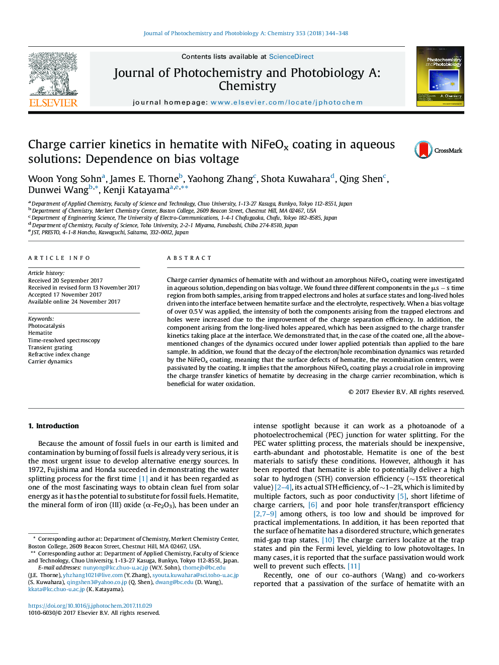 Charge carrier kinetics in hematite with NiFeOx coating in aqueous solutions: Dependence on bias voltage