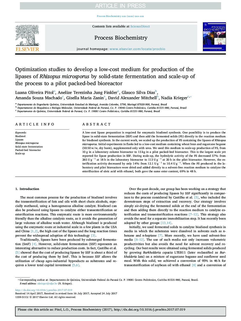 Optimization studies to develop a low-cost medium for production of the lipases of Rhizopus microsporus by solid-state fermentation and scale-up of the process to a pilot packed-bed bioreactor
