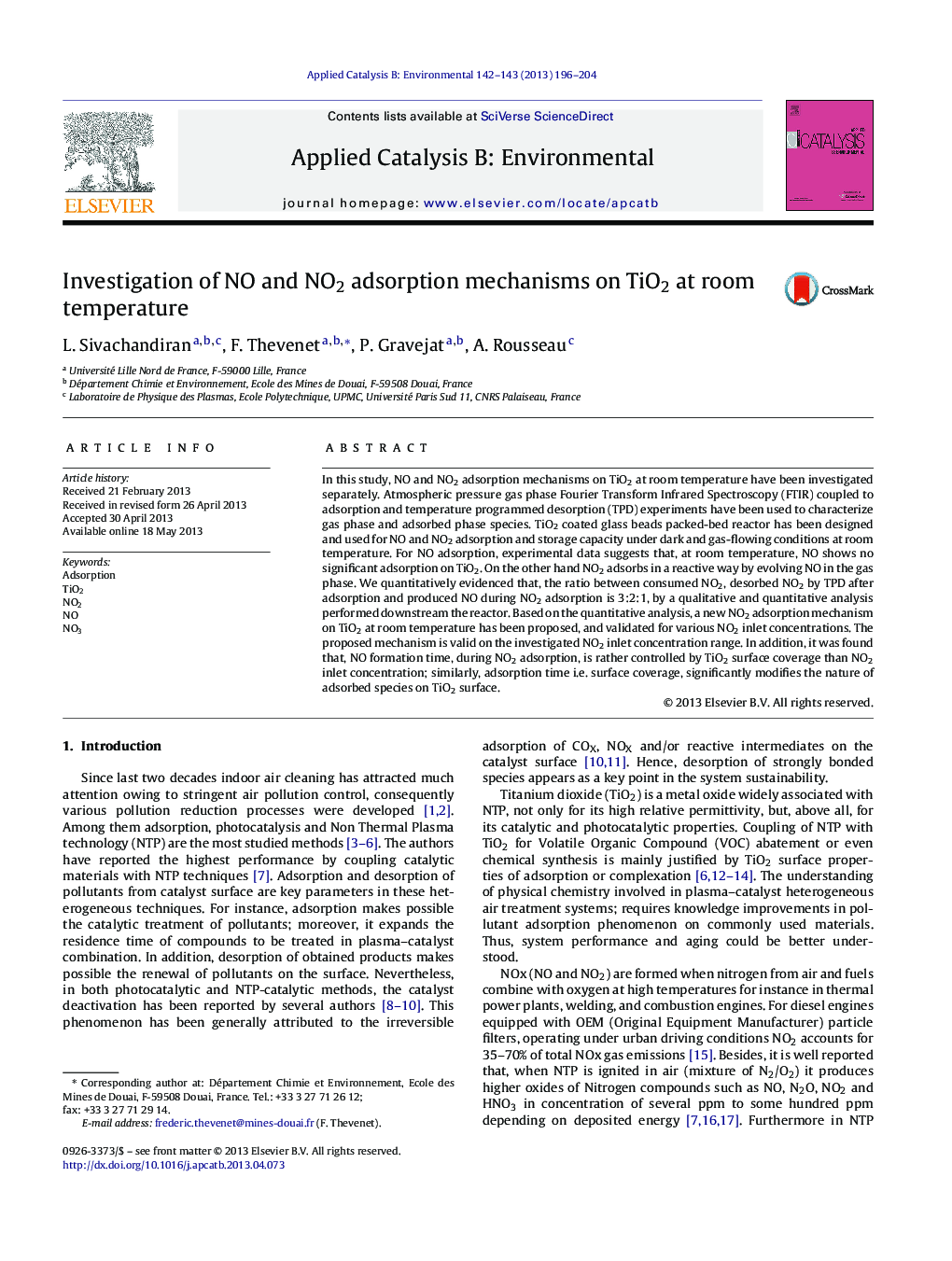 Investigation of NO and NO2 adsorption mechanisms on TiO2 at room temperature