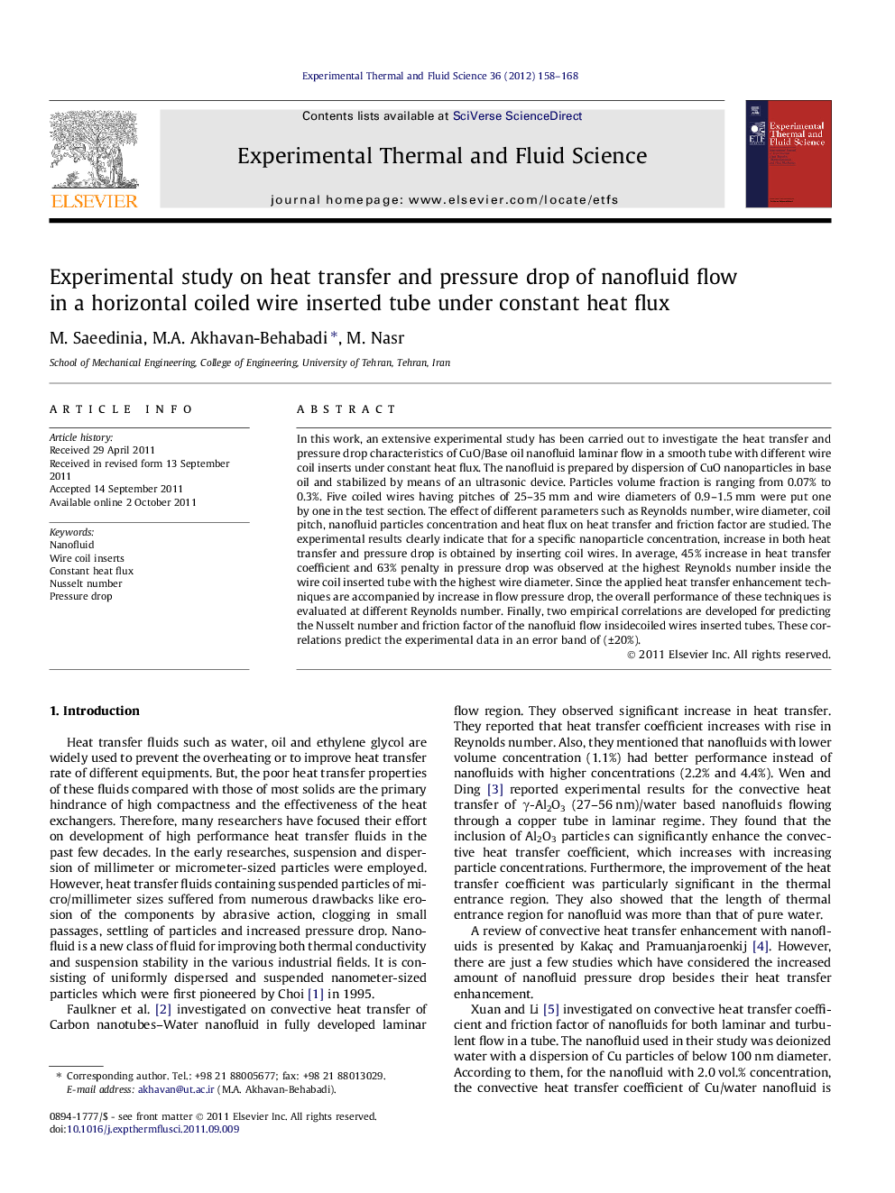 Experimental study on heat transfer and pressure drop of nanofluid flow in a horizontal coiled wire inserted tube under constant heat flux