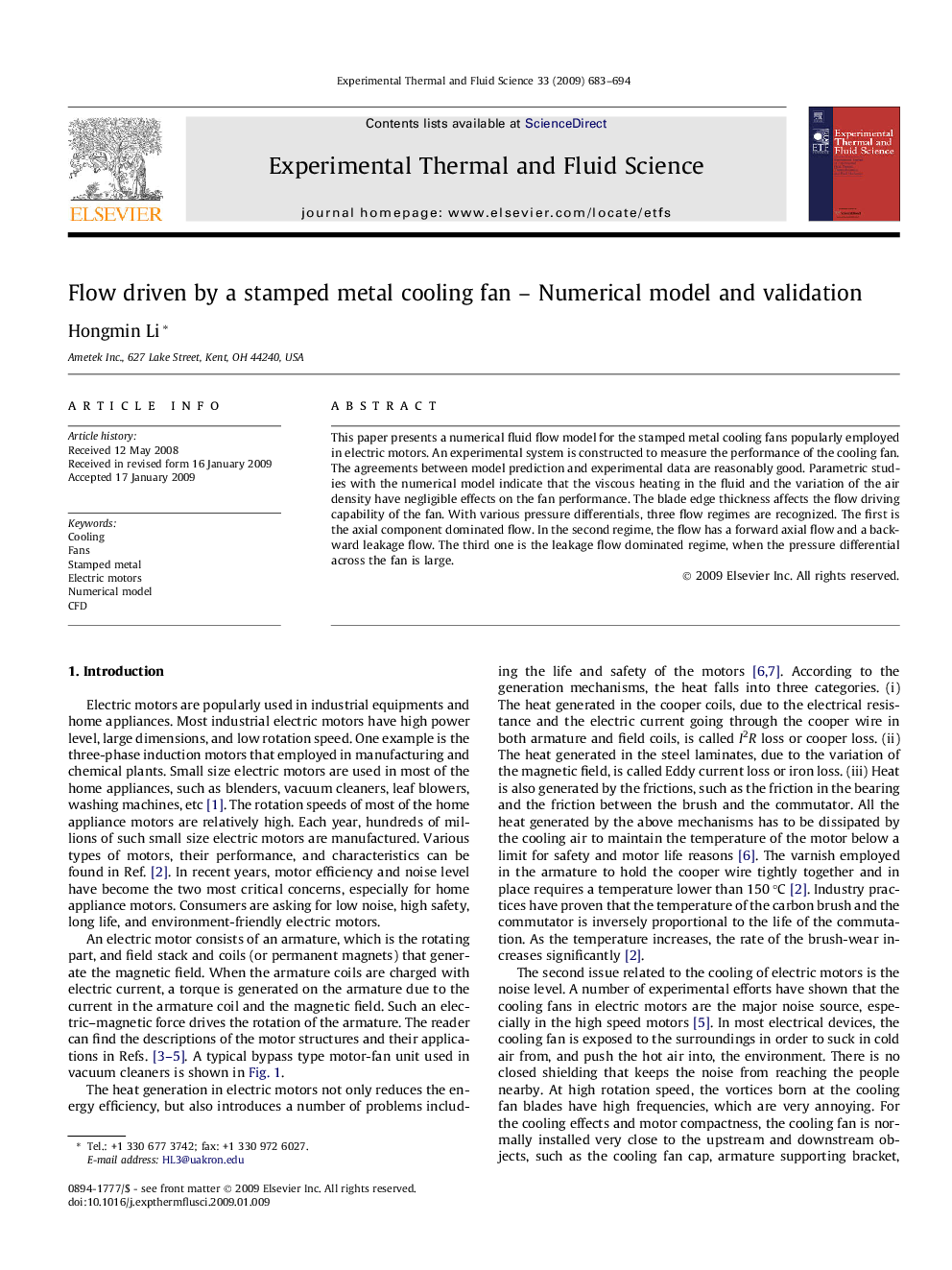 Flow driven by a stamped metal cooling fan - Numerical model and validation