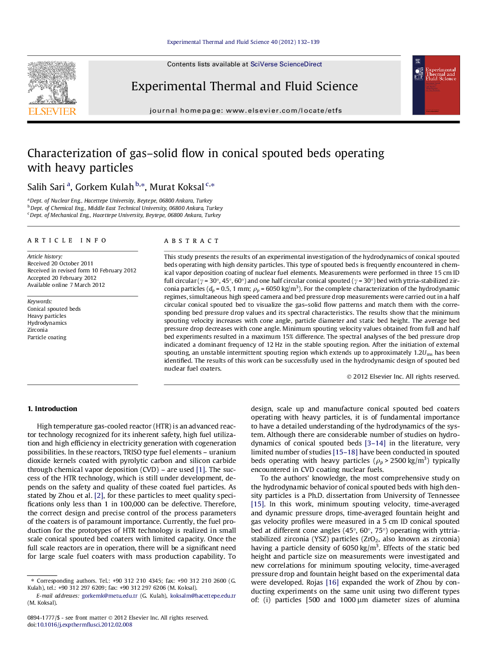 Characterization of gas–solid flow in conical spouted beds operating with heavy particles