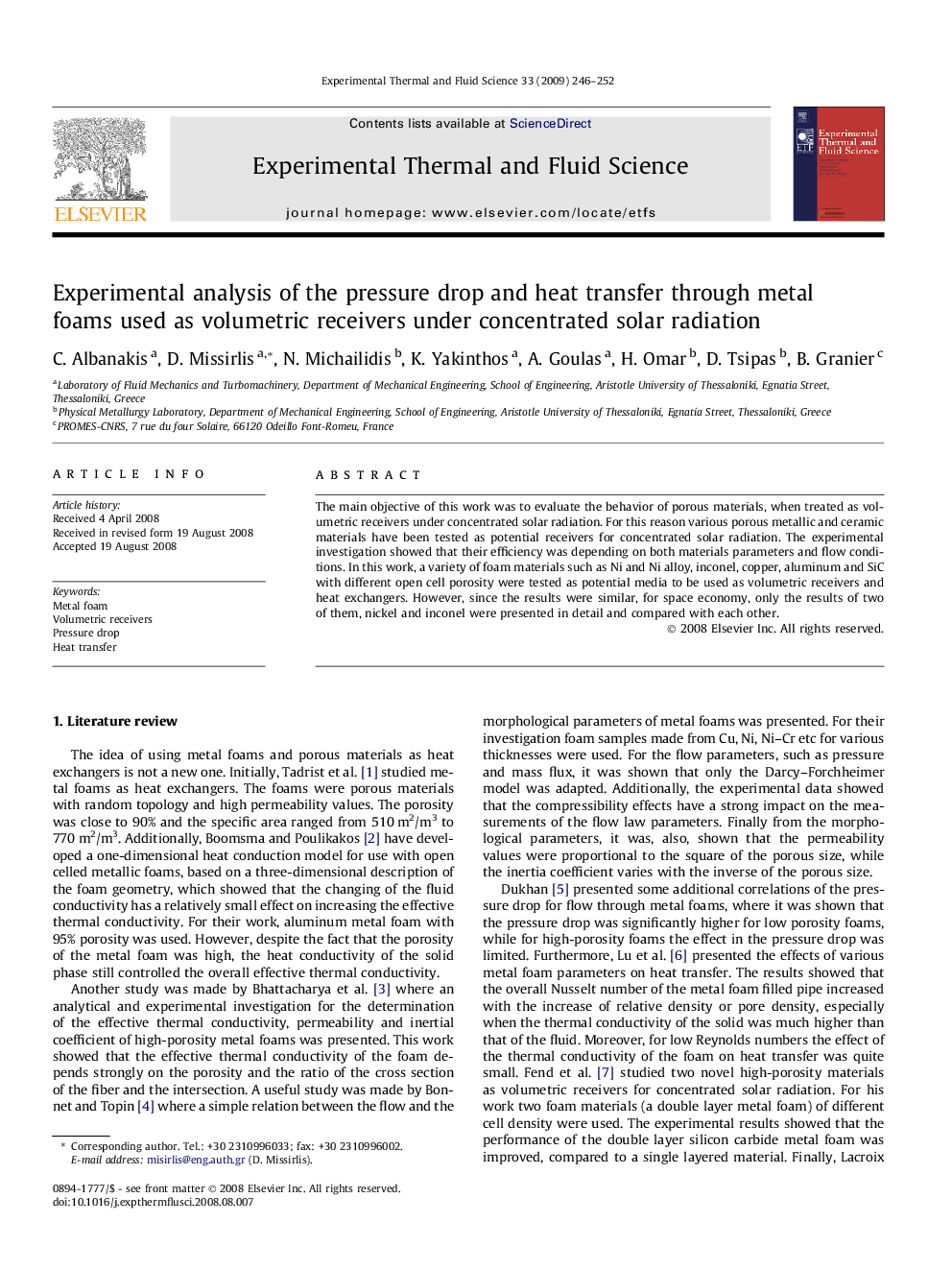 Experimental analysis of the pressure drop and heat transfer through metal foams used as volumetric receivers under concentrated solar radiation