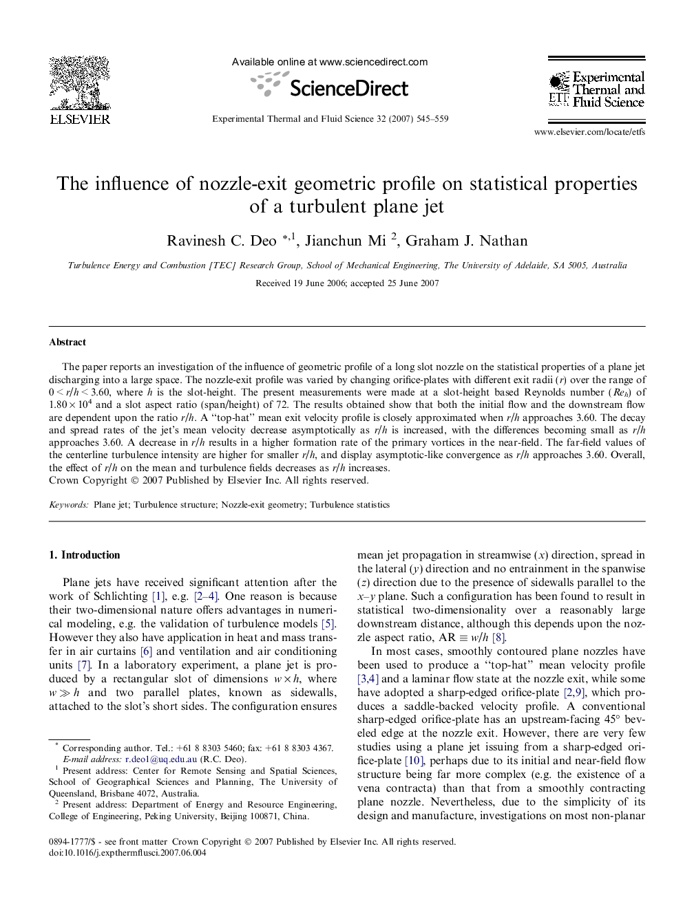 The influence of nozzle-exit geometric profile on statistical properties of a turbulent plane jet