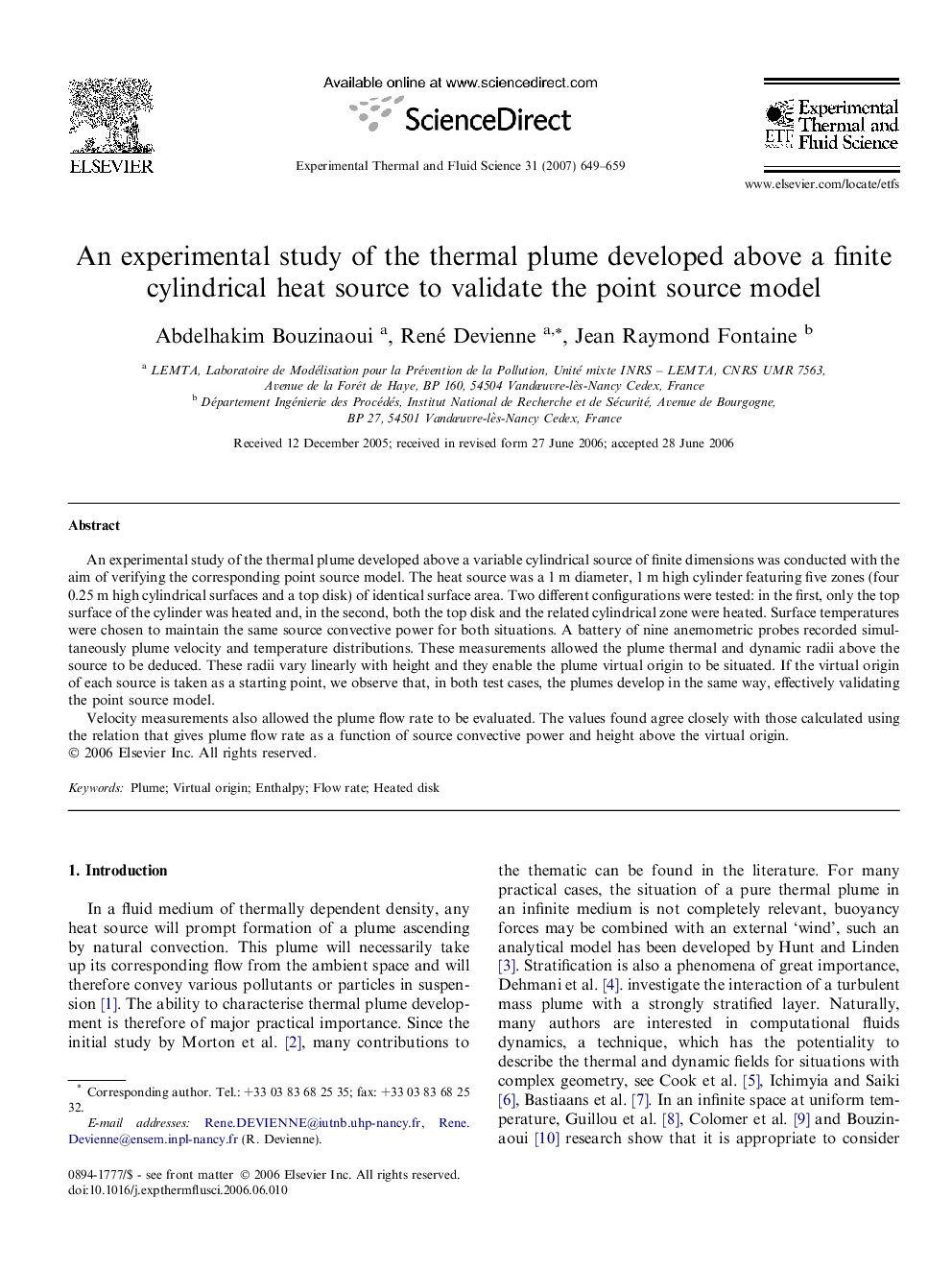 An experimental study of the thermal plume developed above a finite cylindrical heat source to validate the point source model