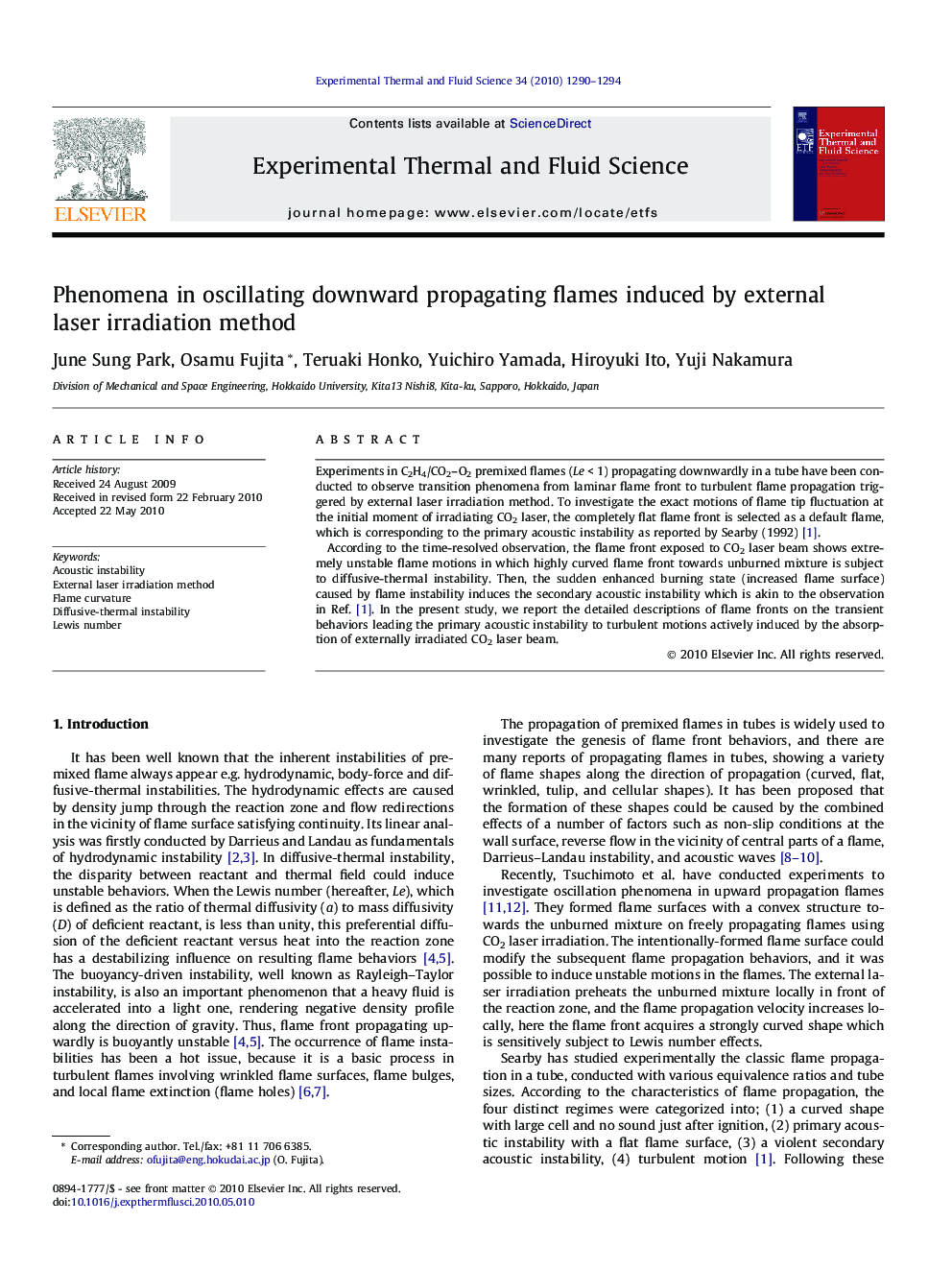 Phenomena in oscillating downward propagating flames induced by external laser irradiation method