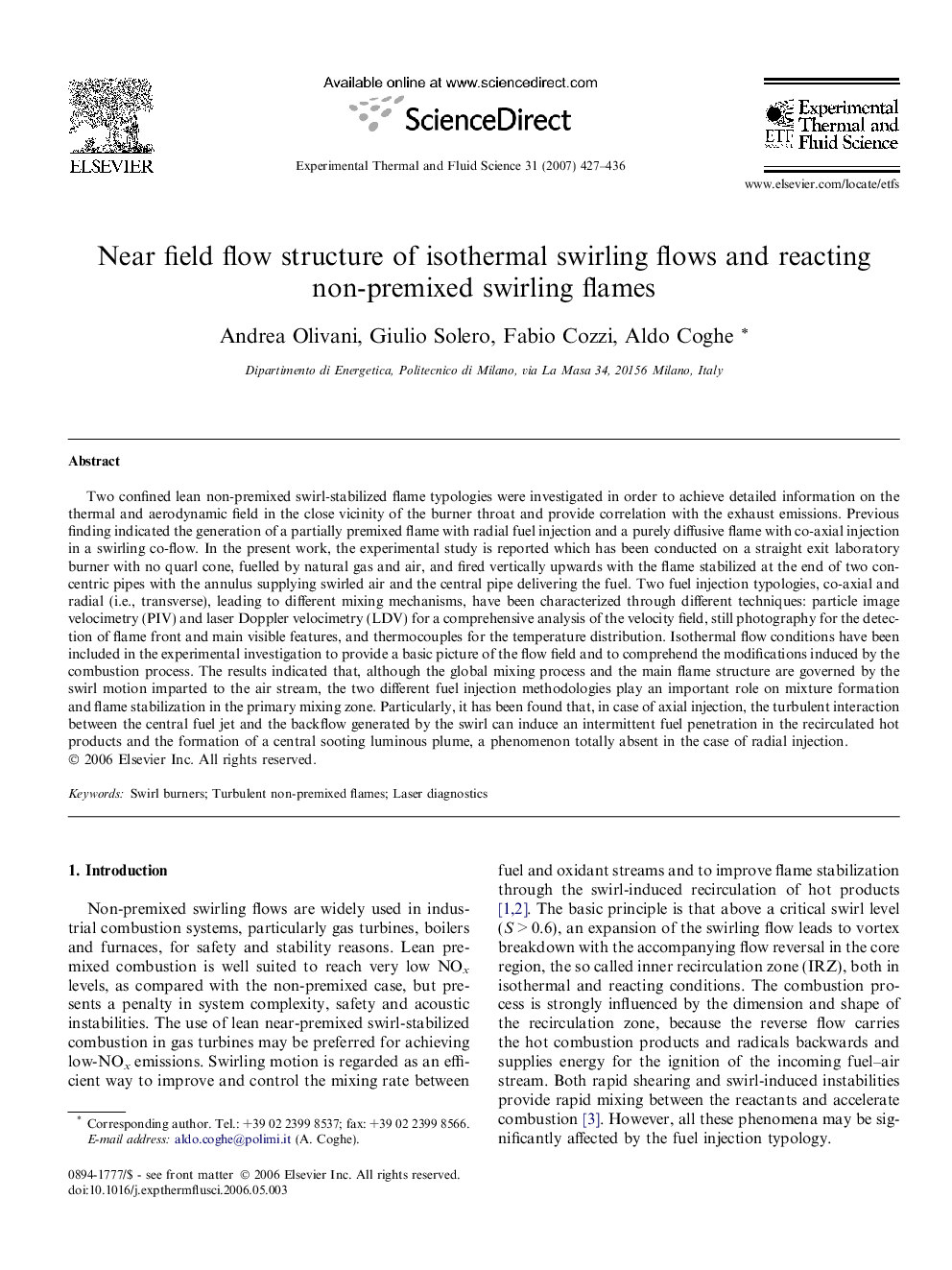 Near field flow structure of isothermal swirling flows and reacting non-premixed swirling flames