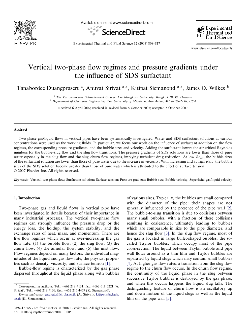 Vertical two-phase flow regimes and pressure gradients under the influence of SDS surfactant