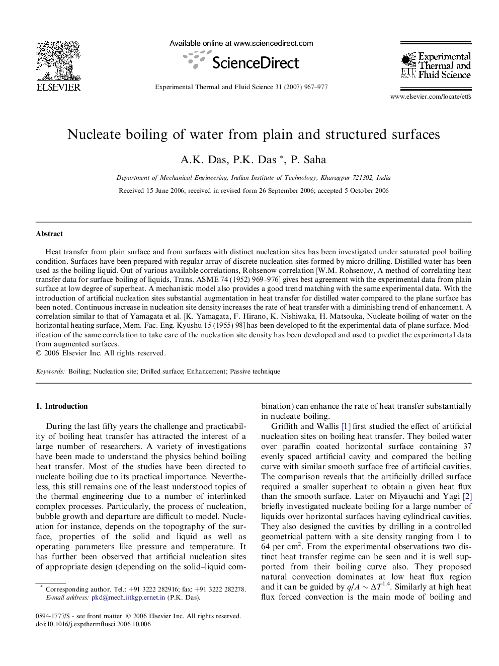 Nucleate boiling of water from plain and structured surfaces