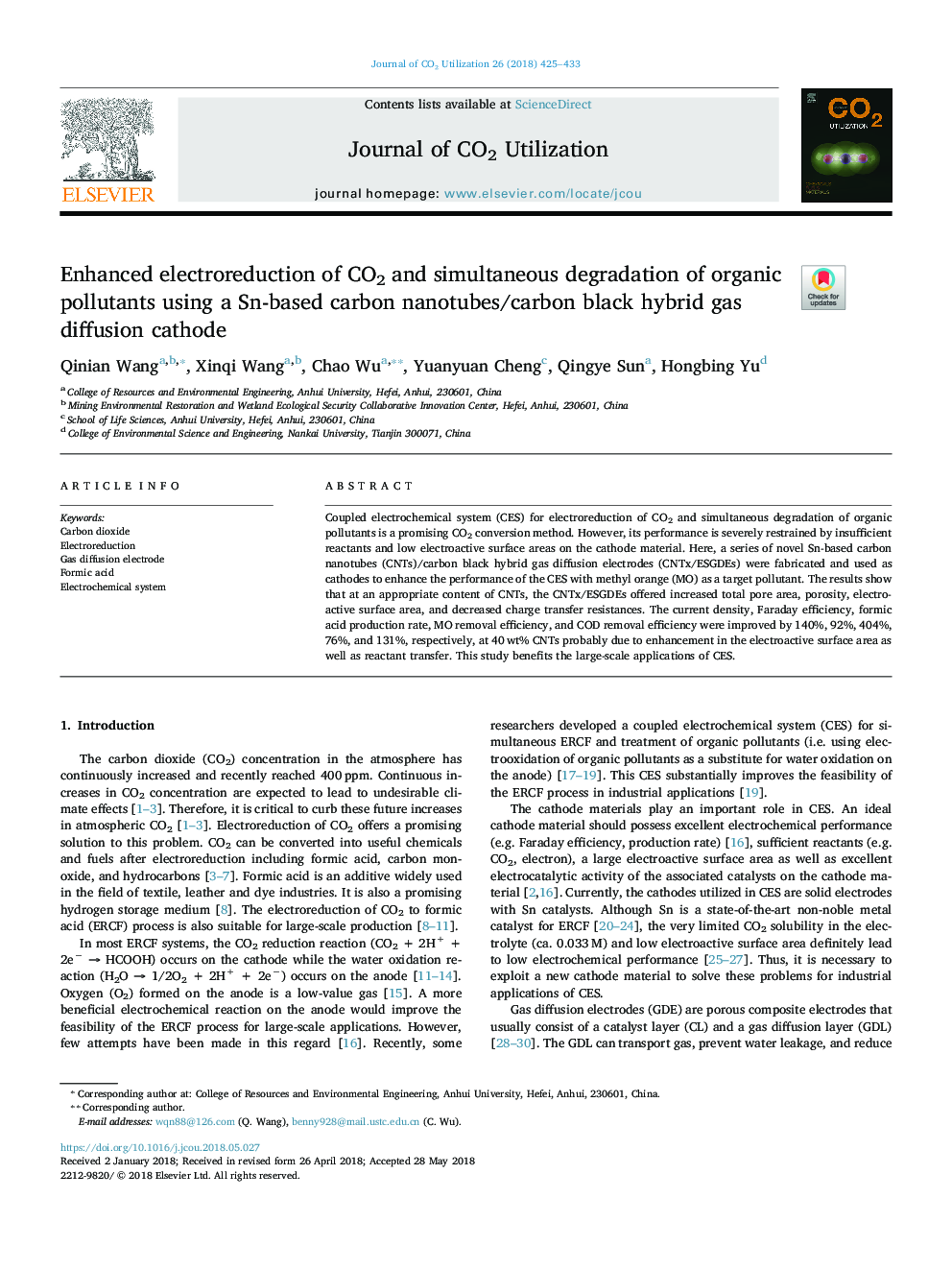 Enhanced electroreduction of CO2 and simultaneous degradation of organic pollutants using a Sn-based carbon nanotubes/carbon black hybrid gas diffusion cathode