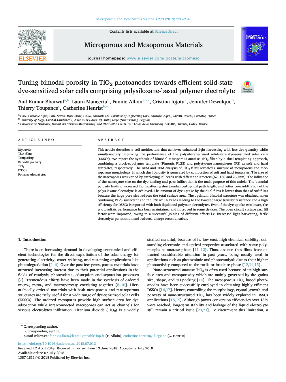 Tuning bimodal porosity in TiO2 photoanodes towards efficient solid-state dye-sensitized solar cells comprising polysiloxane-based polymer electrolyte