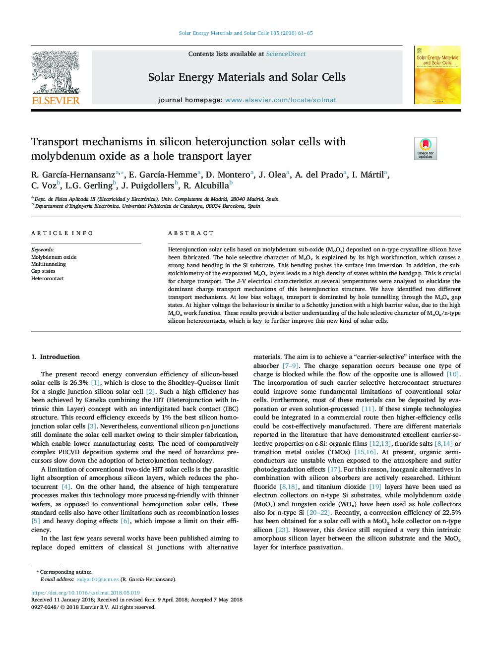 Transport mechanisms in silicon heterojunction solar cells with molybdenum oxide as a hole transport layer