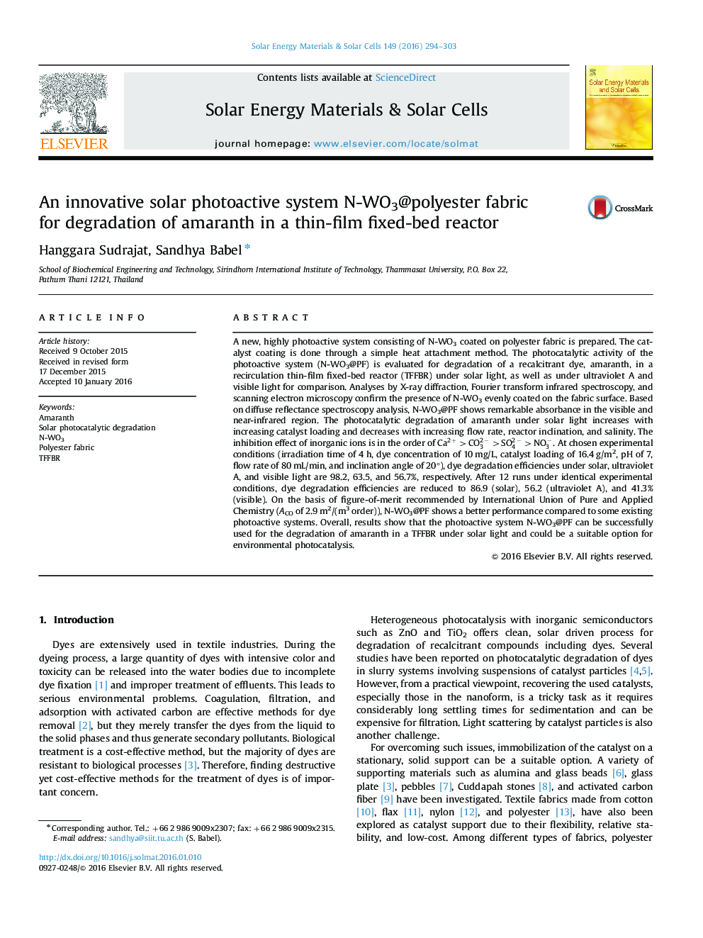 An innovative solar photoactive system N-WO3@polyester fabric for degradation of amaranth in a thin-film fixed-bed reactor