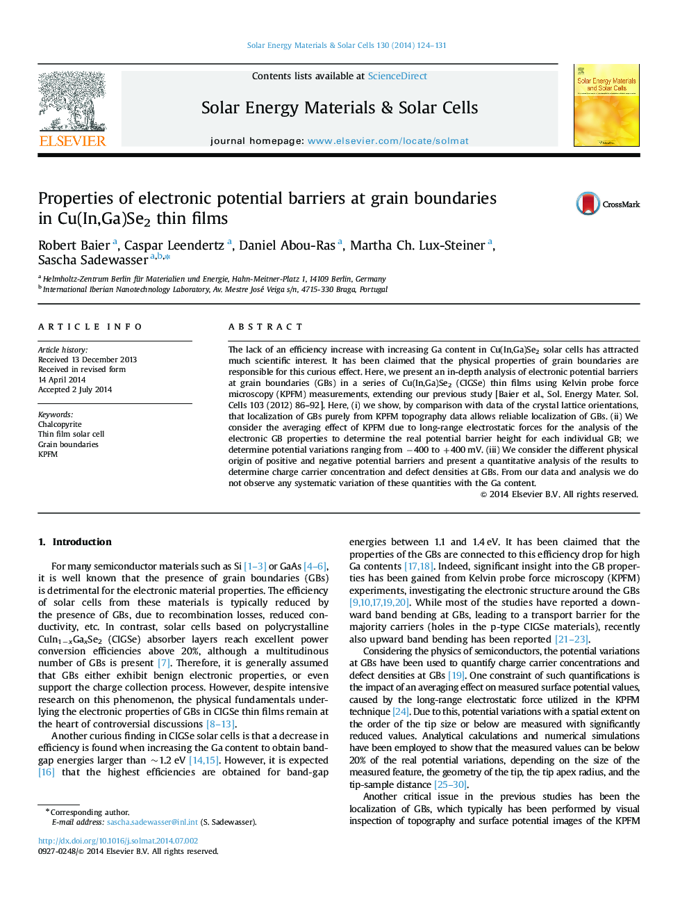 Properties of electronic potential barriers at grain boundaries in Cu(In,Ga)Se2 thin films