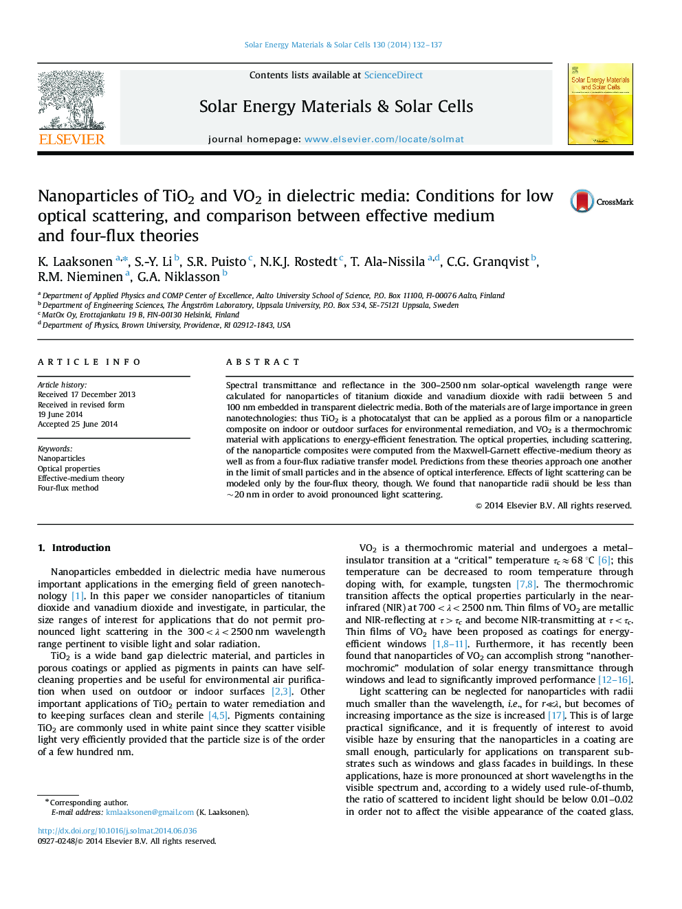 Nanoparticles of TiO2 and VO2 in dielectric media: Conditions for low optical scattering, and comparison between effective medium and four-flux theories