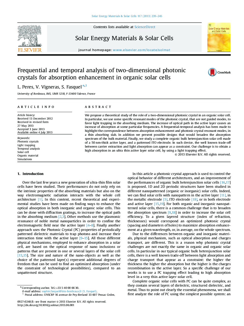 Frequential and temporal analysis of two-dimensional photonic crystals for absorption enhancement in organic solar cells