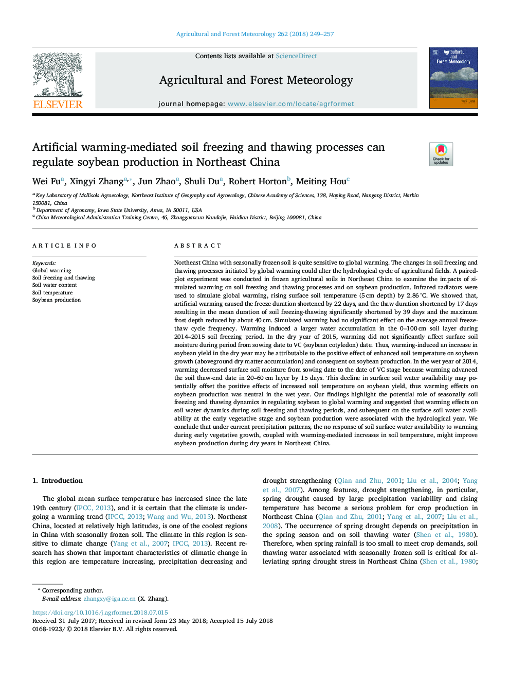 Artificial warming-mediated soil freezing and thawing processes can regulate soybean production in Northeast China