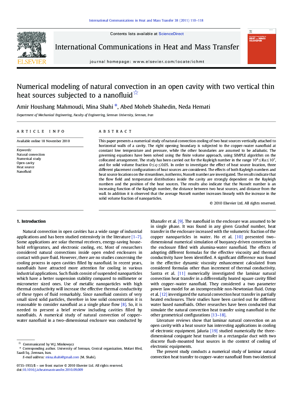 Numerical modeling of natural convection in an open cavity with two vertical thin heat sources subjected to a nanofluid 