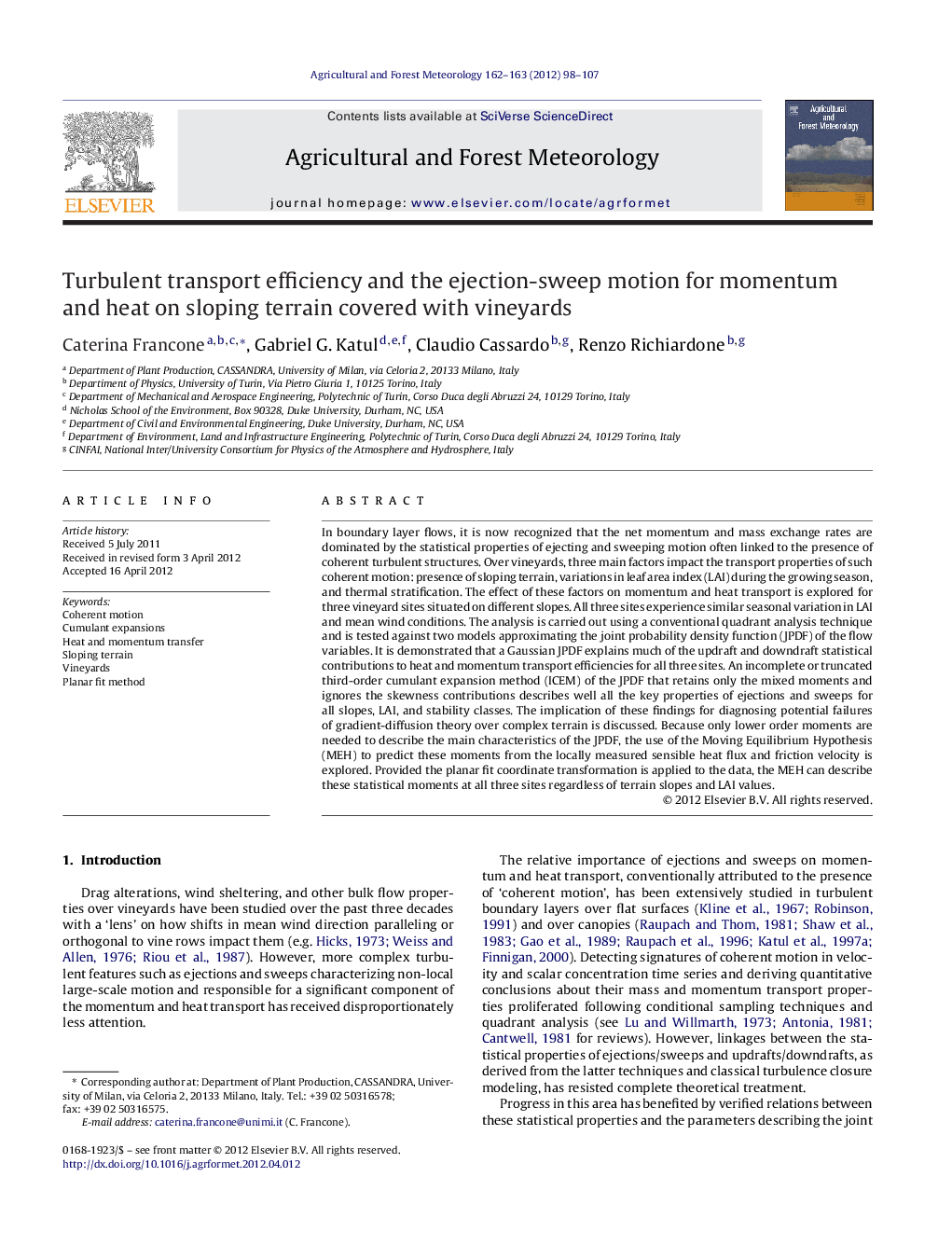 Turbulent transport efficiency and the ejection-sweep motion for momentum and heat on sloping terrain covered with vineyards