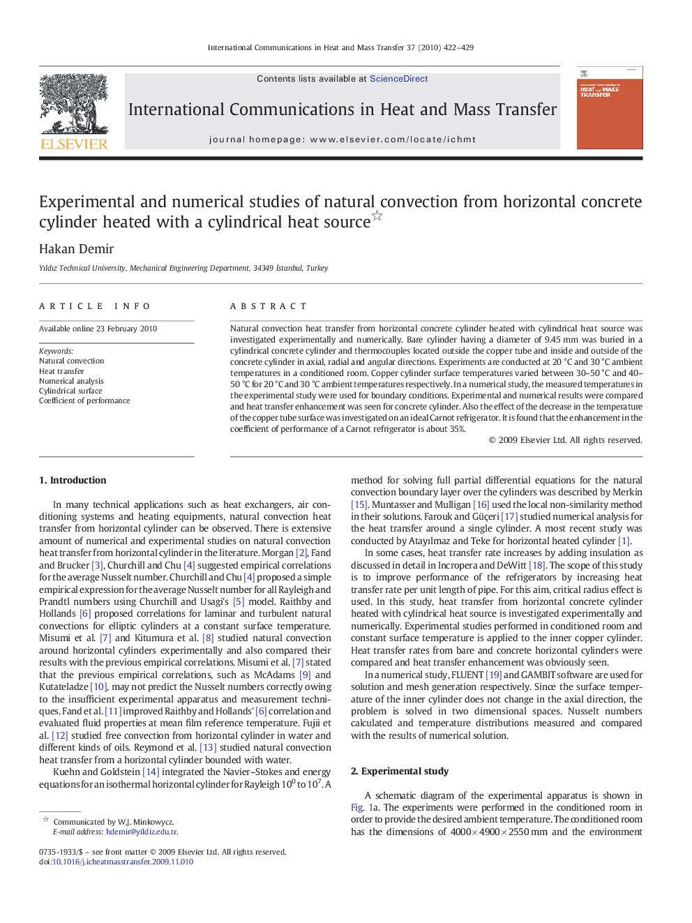 Experimental and numerical studies of natural convection from horizontal concrete cylinder heated with a cylindrical heat source 