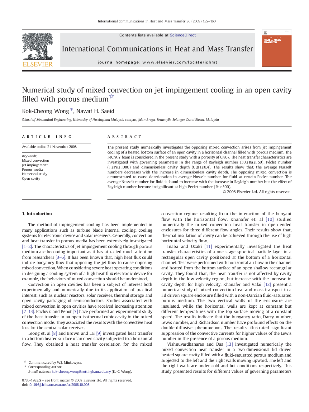 Numerical study of mixed convection on jet impingement cooling in an open cavity filled with porous medium 