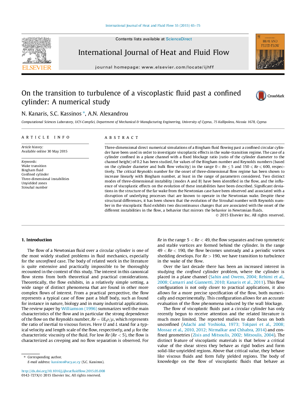 On the transition to turbulence of a viscoplastic fluid past a confined cylinder: A numerical study