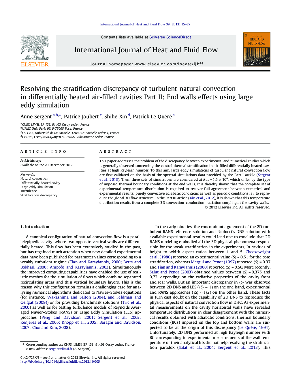 Resolving the stratification discrepancy of turbulent natural convection in differentially heated air-filled cavities Part II: End walls effects using large eddy simulation