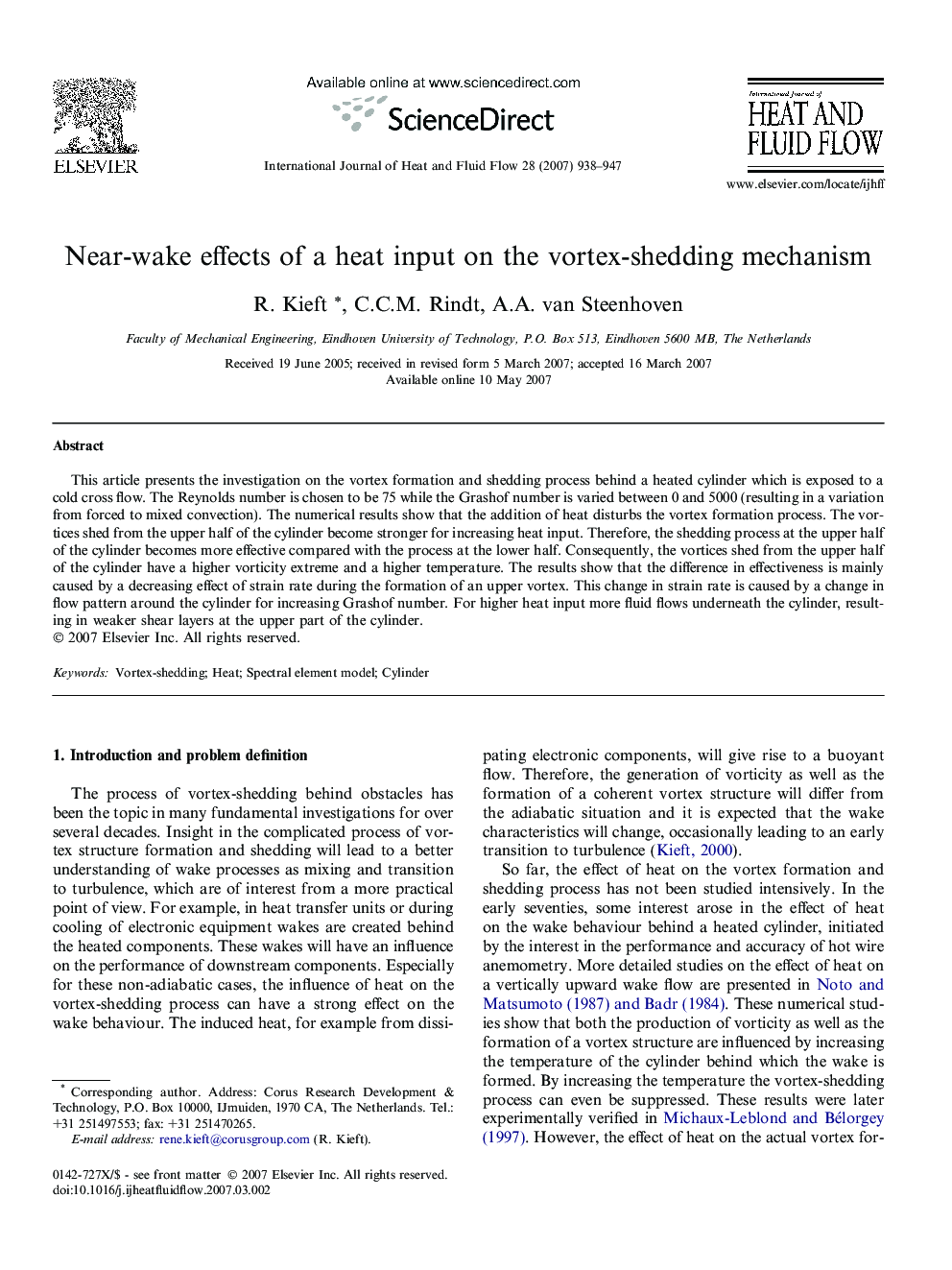 Near-wake effects of a heat input on the vortex-shedding mechanism