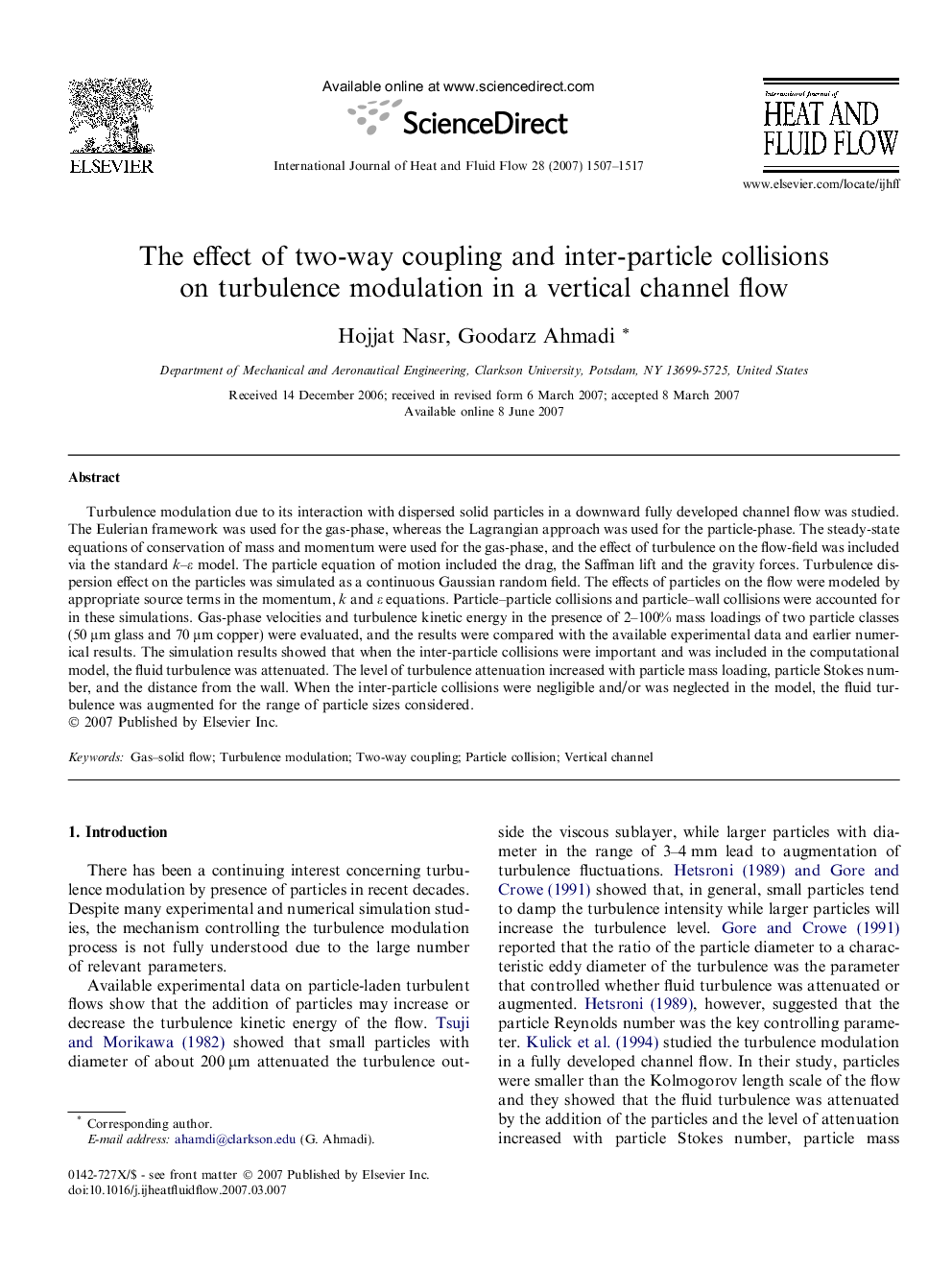 The effect of two-way coupling and inter-particle collisions on turbulence modulation in a vertical channel flow