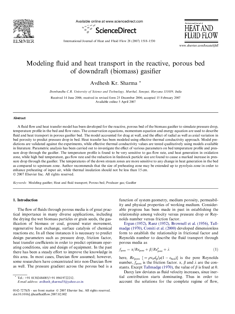 Modeling fluid and heat transport in the reactive, porous bed of downdraft (biomass) gasifier