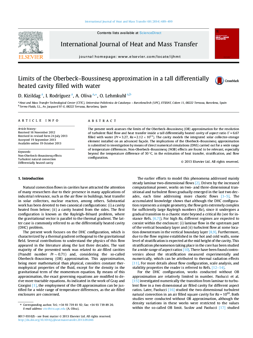 Limits of the Oberbeck–Boussinesq approximation in a tall differentially heated cavity filled with water