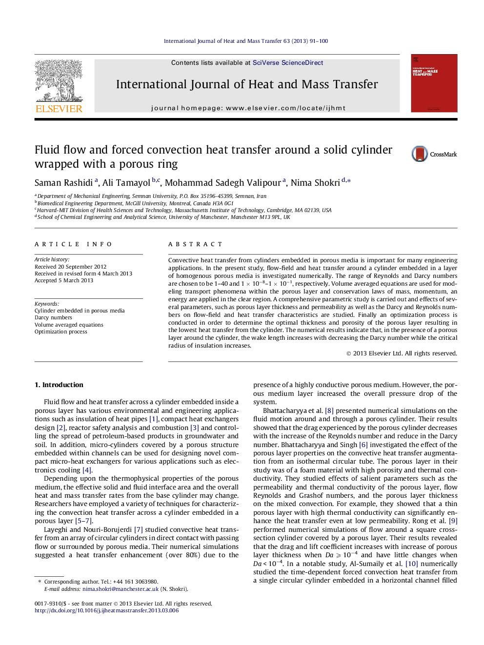 Fluid flow and forced convection heat transfer around a solid cylinder wrapped with a porous ring