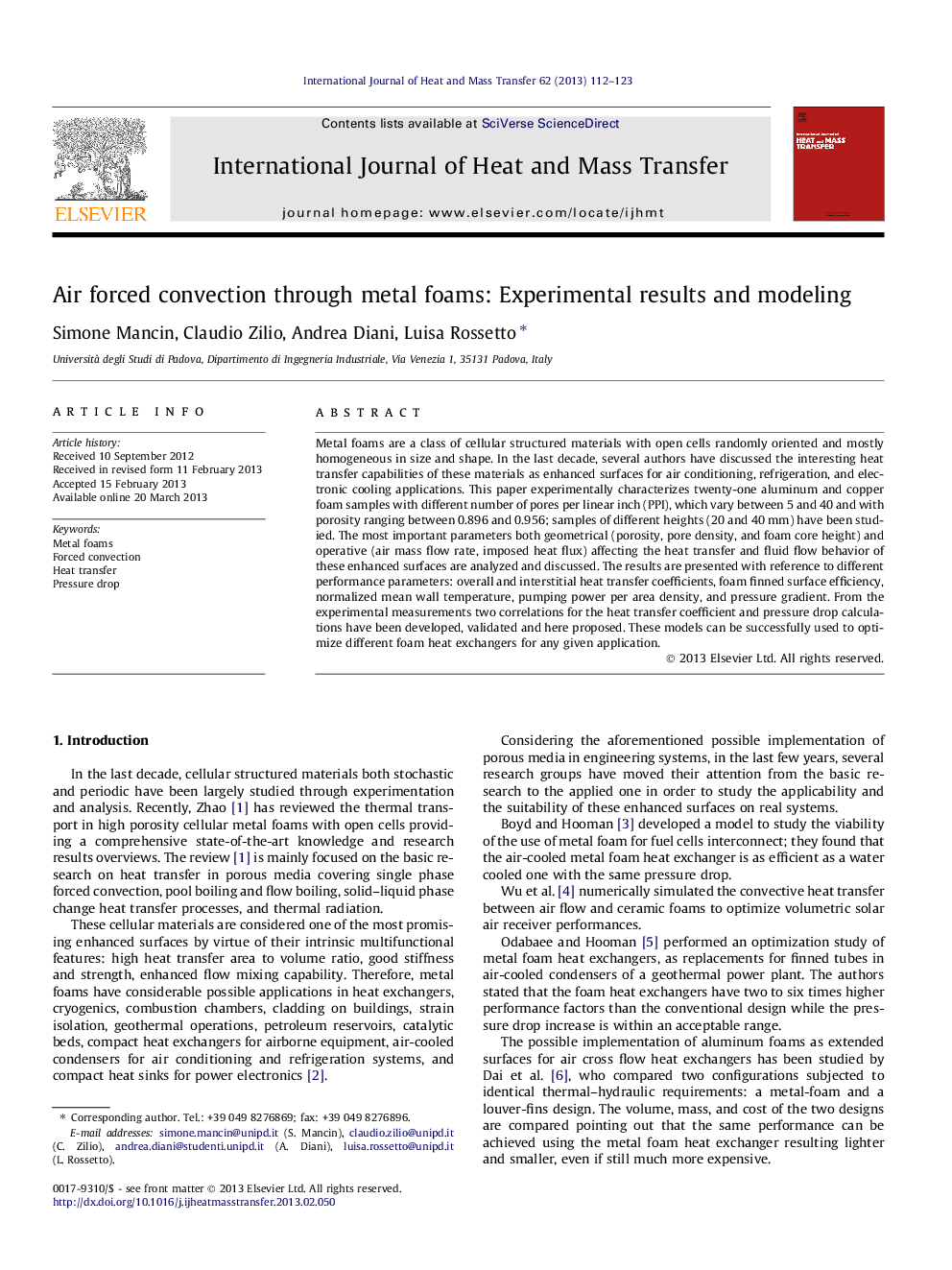 Air forced convection through metal foams: Experimental results and modeling